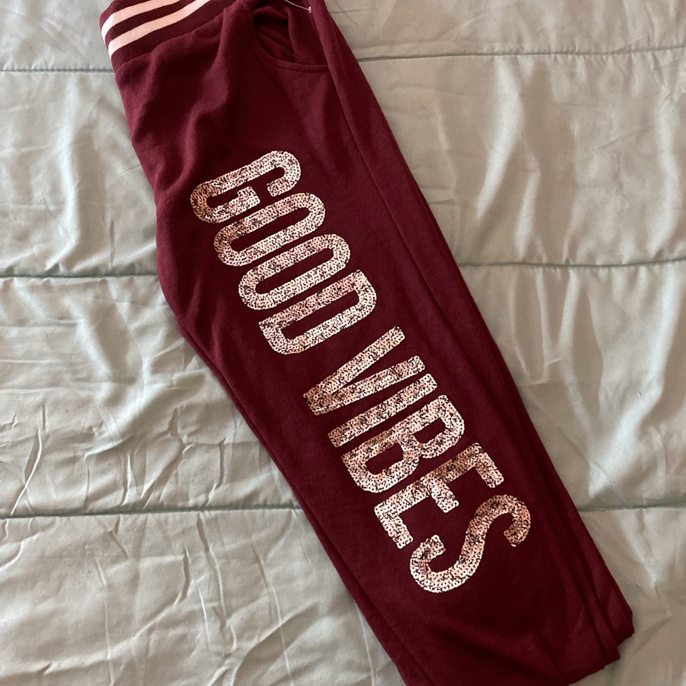 Rue21 Burgundy joggers with Good Vibes Print